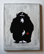 一輪の花を持つチンパンジー 赤花